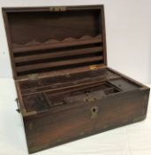 An Indian hardwood and brass strung travelling box with various lidded compartments, 41.