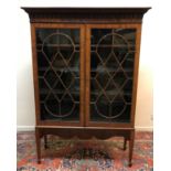 An early 19th Century mahogany bookcase cabinet,