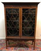 An early 19th Century mahogany bookcase cabinet,