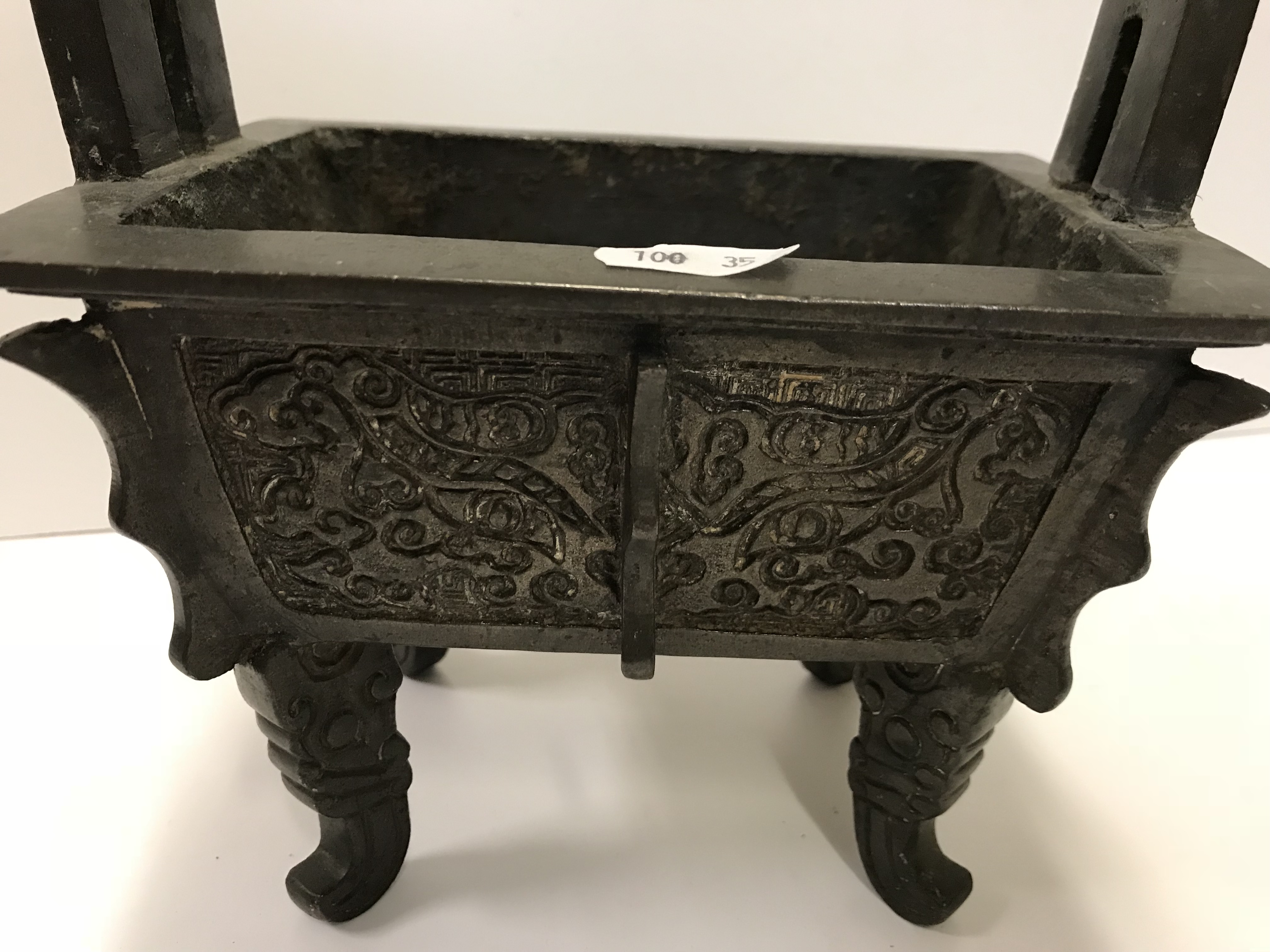 A Chinese bronze censer of rectangular form with relief work foliate decoration, - Image 15 of 19