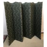 An early 20th Century floral upholstered six fold dressing screen 258 cm wide x 180 cm high