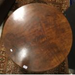 A circa 1800 mahogany tea table,