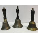 Three various wooden handled hand bells 20.