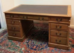 An early 20th Century mahogany double pedestal desk,