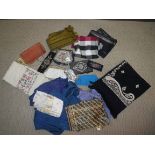 A box containing various evening bags to include a chainmail style evening bag, spectacles case,