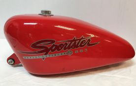 A Harley Davidson Sportster 883 petrol tank, red 51 cm long x approx. 25.