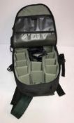 A large quantity of various camera cases, travel bags, magazines on photography,