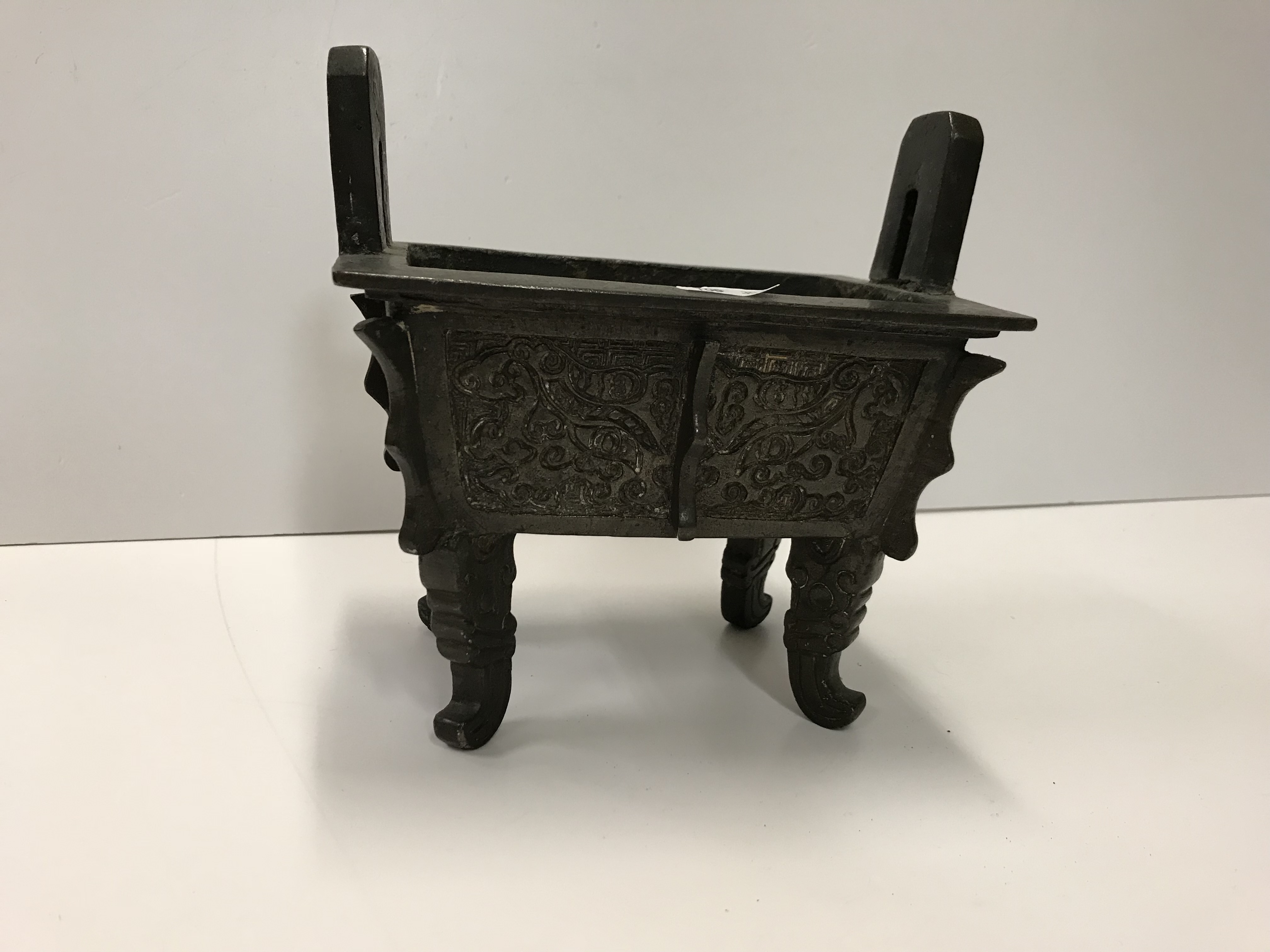 A Chinese bronze censer of rectangular form with relief work foliate decoration, - Image 11 of 19