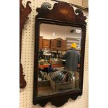 An 18th Century walnut and marquetry medallion inlaid wall mirror 76 cm x 38 cm