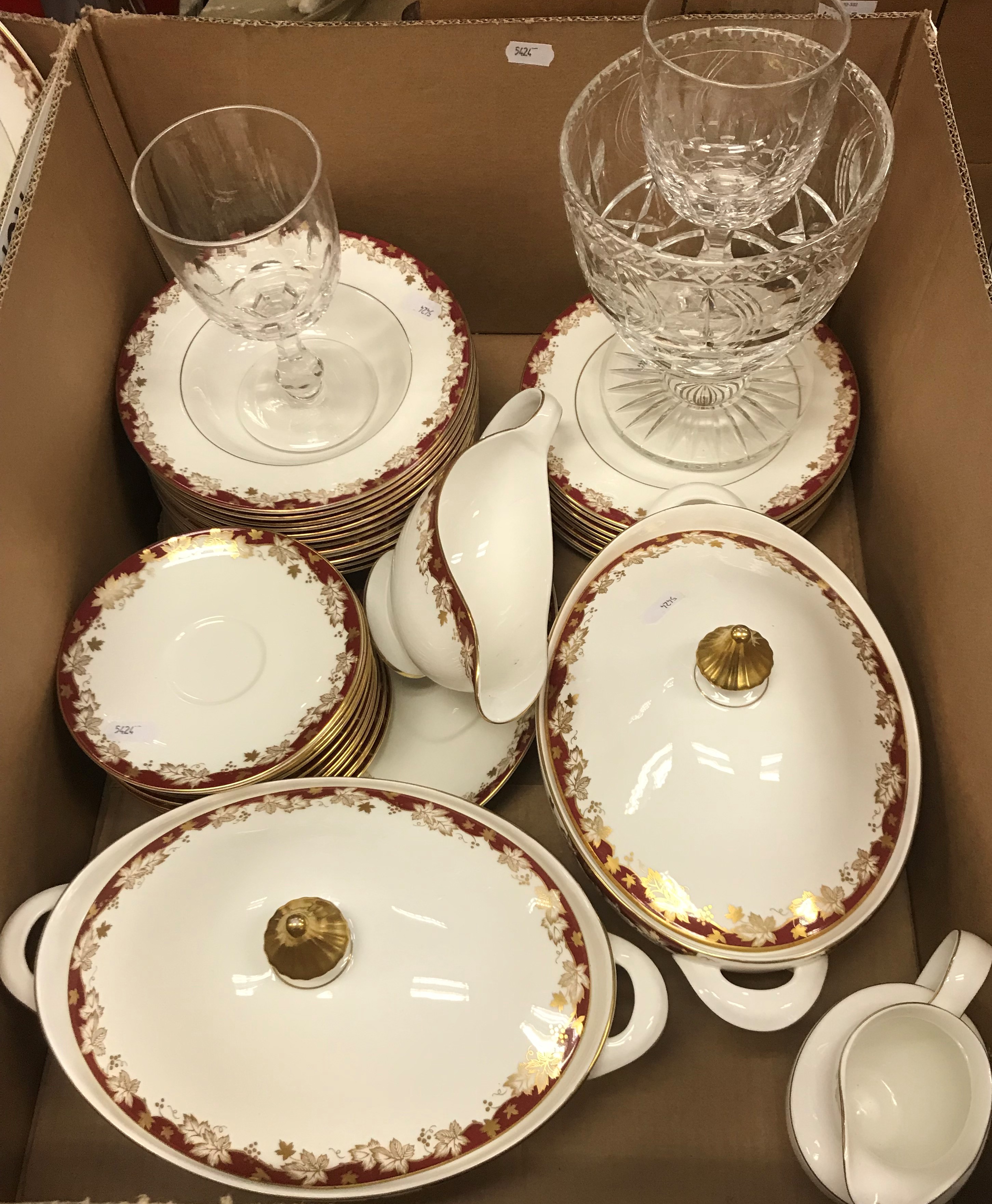 A Royal Doulton Winthrop (H4969) dinner service with gilt grape and vine and burgundy banding