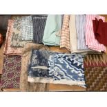 Two boxes of assorted textiles to include fabric remnants including Liberty, Zoffany etc,