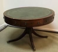 A 19th Century mahogany and inlaid drum table,