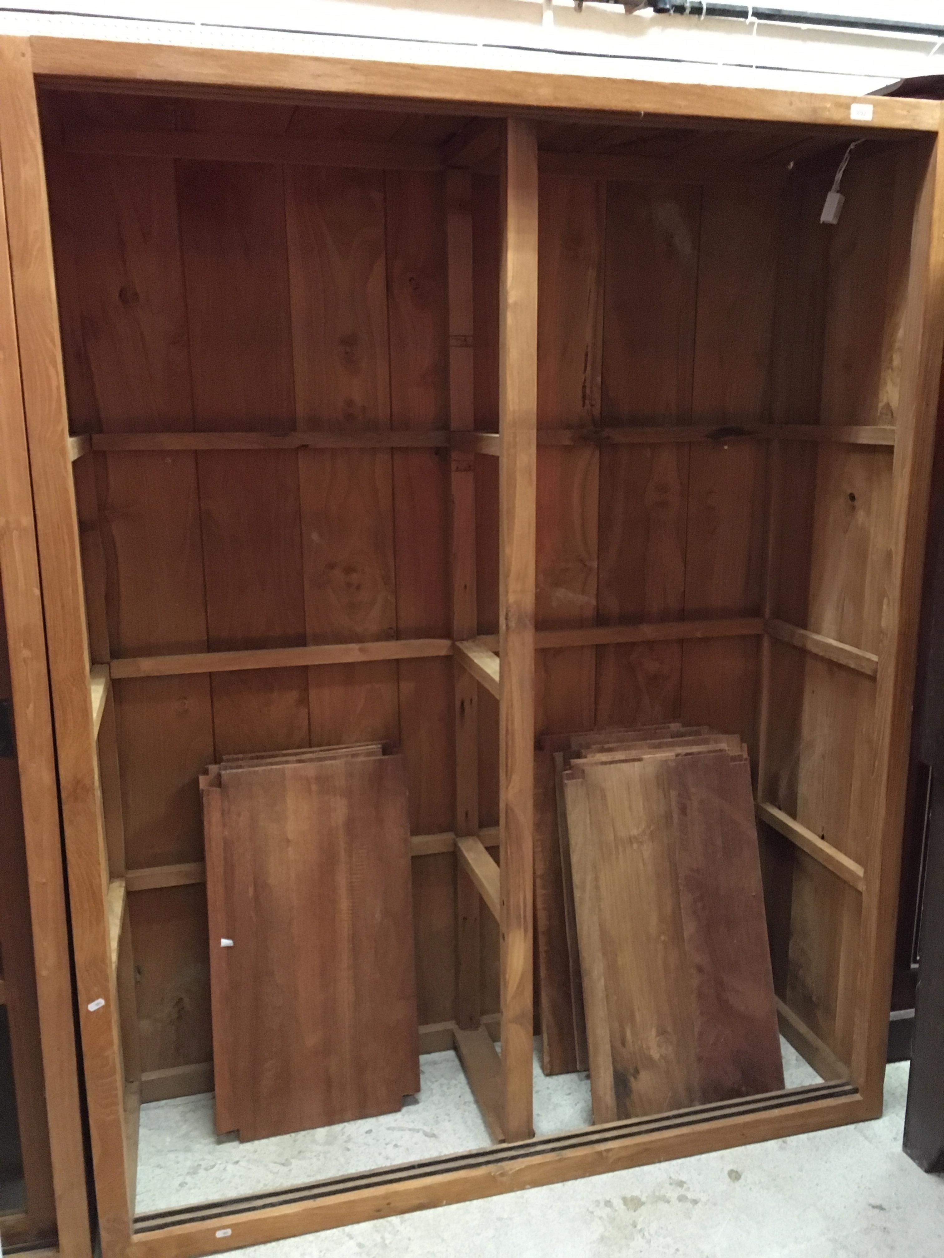 A pair of modern teak bookcase cabinets with sliding doors 150 cm wide x 50 cm deep x 190. - Image 2 of 2