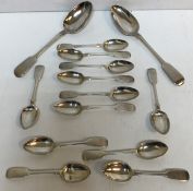 A set of six "Fiddle" pattern teaspoons (by Josiah Williams & Co.