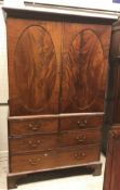 A 19th Century mahogany linen press,