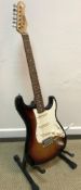 A Stagg Stratocaster copy guitar,