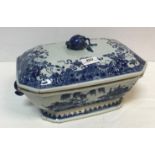 An 18th Century Chinese blue and white tureen and cover with pomegranate finial within a border of