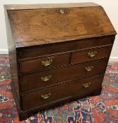 An 18th Century oak bureau,