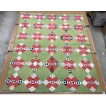 A mid 20th Century broken plate pattern type quilt with some earlier fabrics, 167 cm x 205 cm,