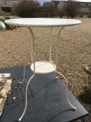 A modern black painted metal garden table with chequer pierced top 180 cm x 95.