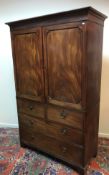 A 19th Century mahogany linen press,