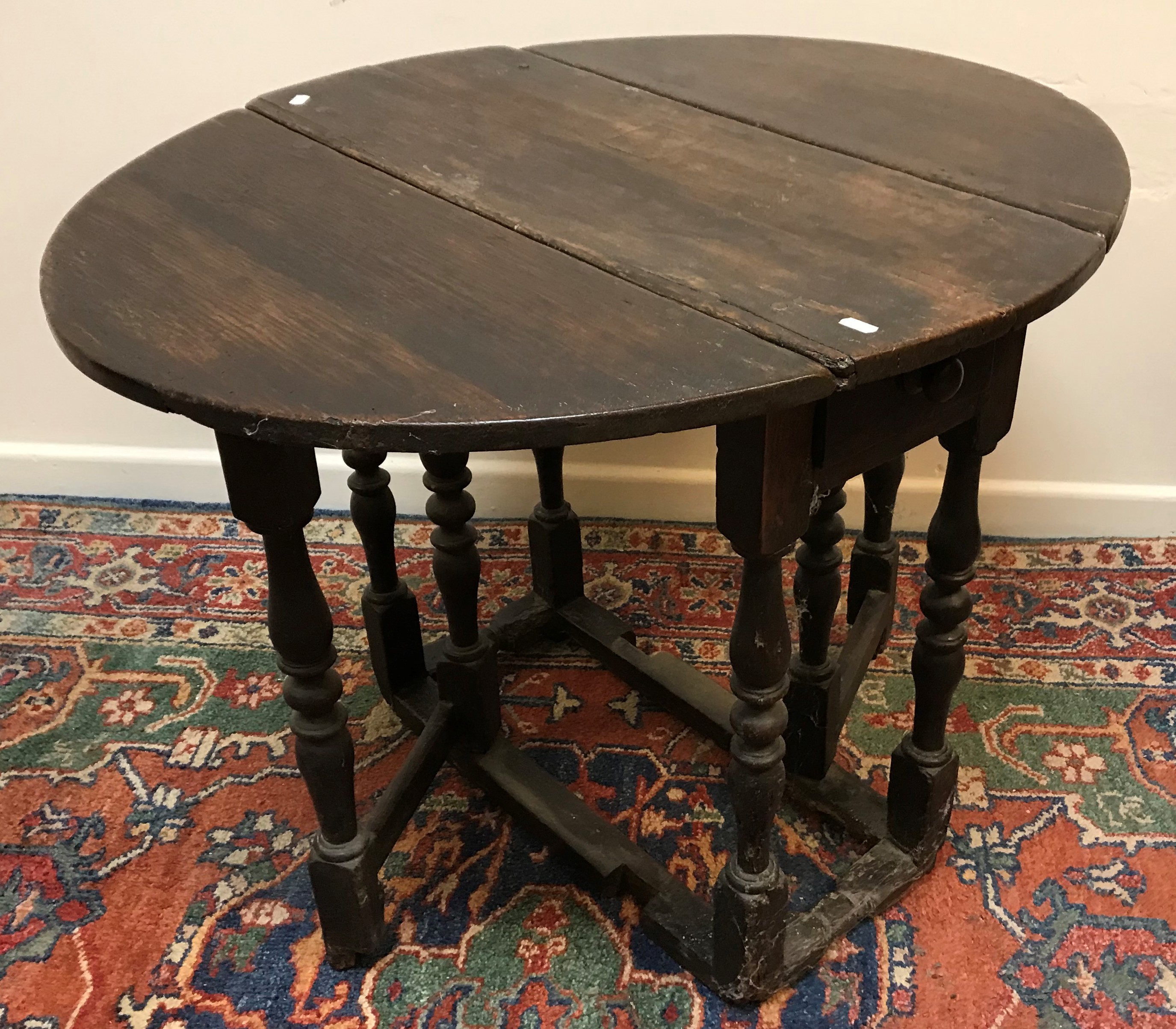 An 18th Century oak oval gate-leg tea table of small proportions, with single end drawer, - Image 2 of 2