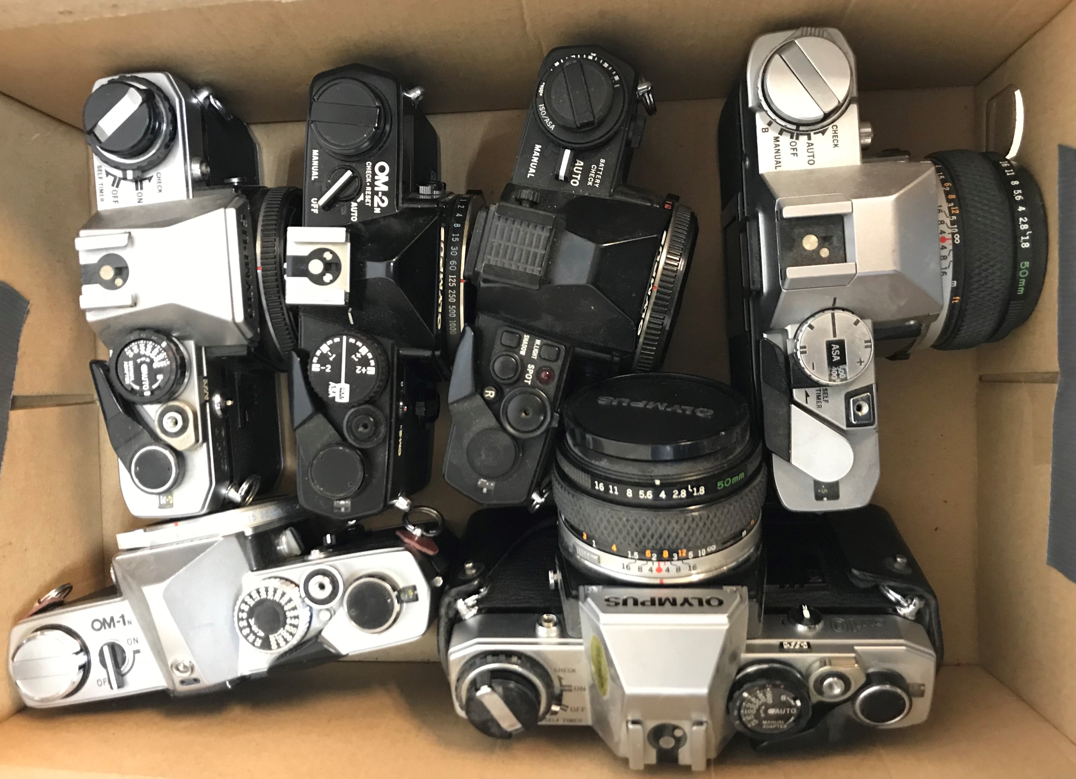 A collection of eight various Olympus cameras including OM-1N, OM2-Spot/Programme, OM-2 2N, OM10 x2, - Image 2 of 4