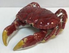 A Bordallo Pinheiro (Portugal) red and yellow glazed pottery lobster,