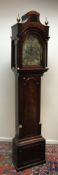 A George III mahogany long case clock, the eight day movement with brass arched dial,