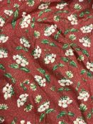 A pair of Jane Churchill red ground floral decorated cotton interlined curtains with fixed double