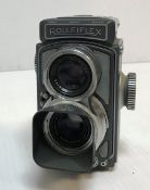 A Franke & Heideke Rolleiflex twin reflex camera, pale and dark grey colourway (No.
