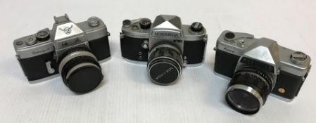 A collection of six various Japanese cameras including a Miranda Sensomat, Lumix FZ100,