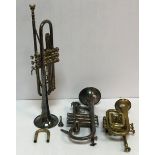 A Boosey & Hawkes plated trumpet with engraved decoration,