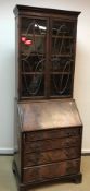 A circa 1900 mahogany bureau bookcase,