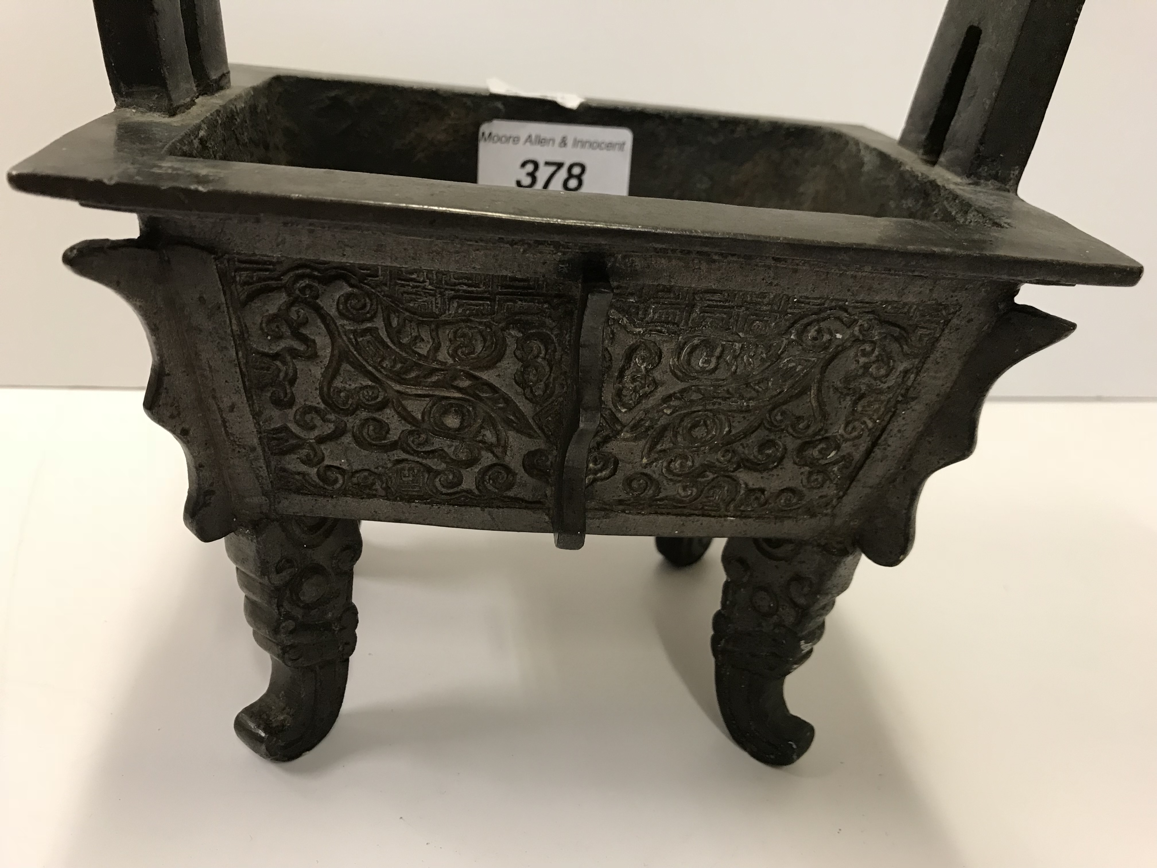 A Chinese bronze censer of rectangular form with relief work foliate decoration, - Image 17 of 19