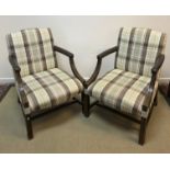 A pair of modern beech framed Gainsborough type armchairs with check upholstered back and seat and