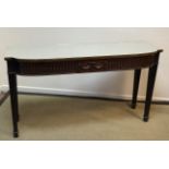 A 20th Century mahogany serving table in the Adam taste,