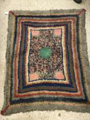 An early 20th Century rag rug,