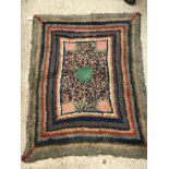 An early 20th Century rag rug,