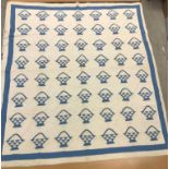 A circa 1900 blue and white basket pattern quilt,