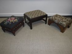 A George III style mahogany framed footstool on square moulded and chamfered supports with