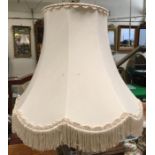 A mid 20th Century lampshade with yellow silk padded embroidery and lace decoration