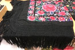 Two early 20th Century piano shawls with embroidered floral decoration,