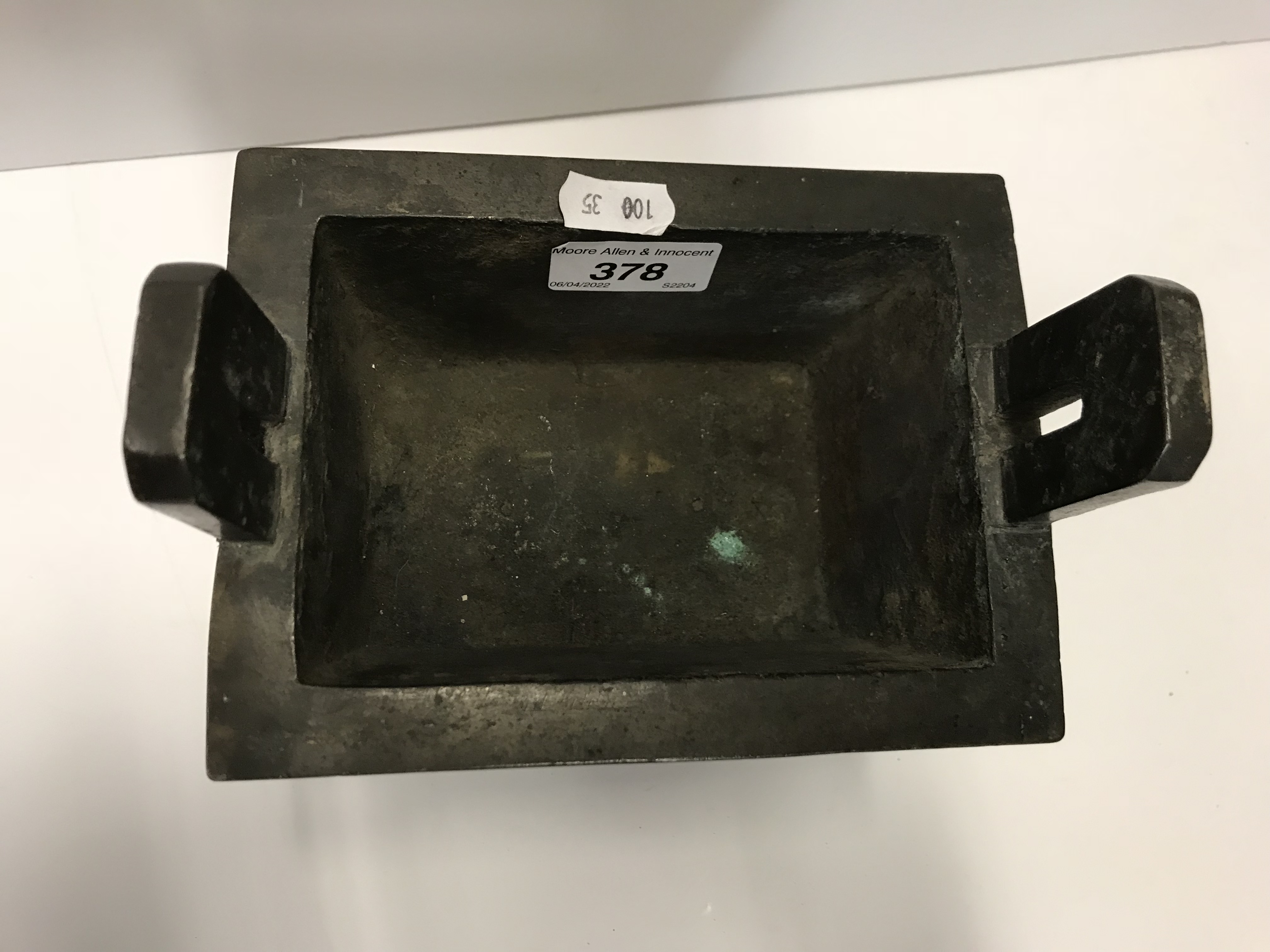 A Chinese bronze censer of rectangular form with relief work foliate decoration, - Image 14 of 19