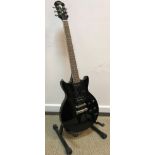 A Hofner black bodied cut away electric guitar,