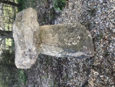 A natural stone staddle stone