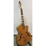 A mid-20th Century Posetti faux mother of pearl embellished violin bodied jazz guitar with