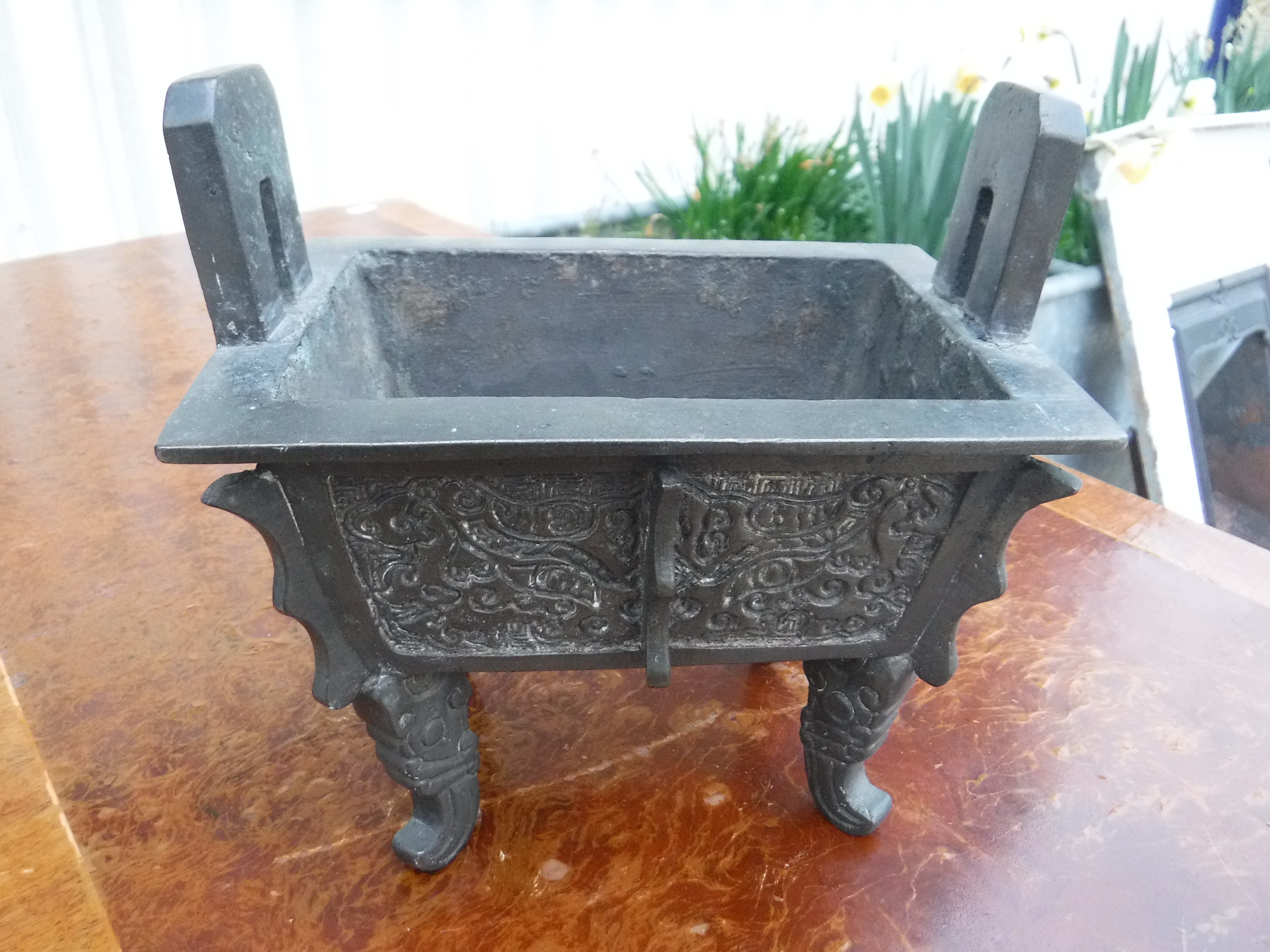 A Chinese bronze censer of rectangular form with relief work foliate decoration, - Image 4 of 19