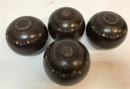 A set of four RW Hensell & Sons (Australia) Championship lawn bowls, 5 inch TF886,