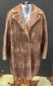 A musquash fur jacket, together with a b